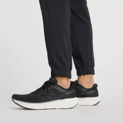New Balance Treenivaatteet*treenihousut Sport Essentials Woven Jogger 001 BLACK